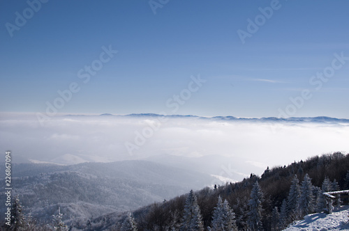 winter mountains up above the clouds