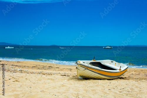 photo of the beautiful boat on the sea background
