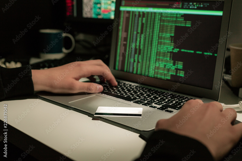Computer hacker using laptop Computer hacker using laptop