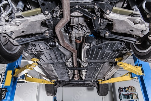 Fotografia Car on a Lift Repair