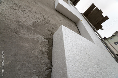 Quadro su tela Close-up detail of plastered house wall with rigid styrofoam insulation