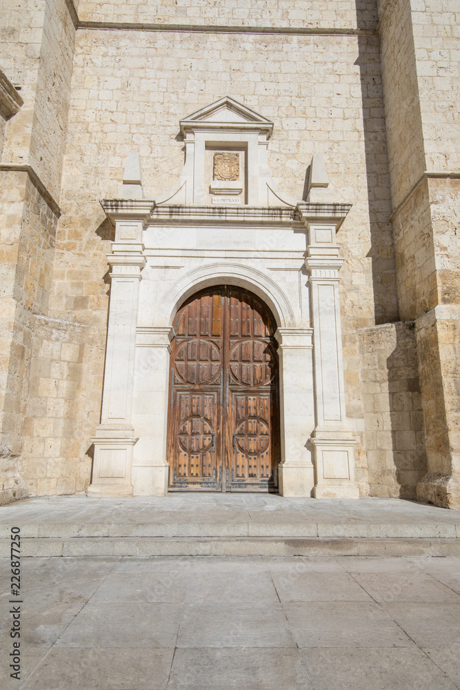 side door of landmark cathedral of San Antolin, gothic monument from fourteenth century, in Palencia city, Castile Leon, Spain, Europe