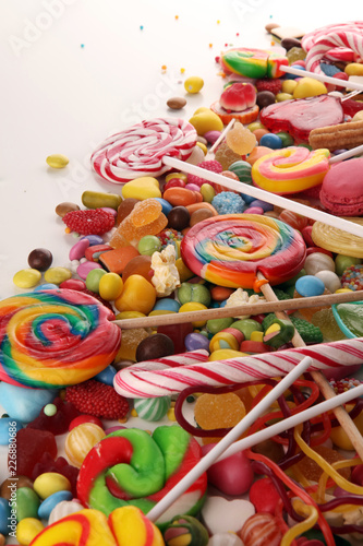 candies with jelly and sugar. colorful array of different childs sweets and treats.