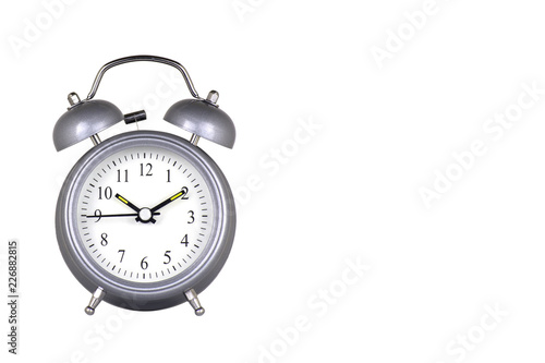 Grey alarm clock with bells on white background