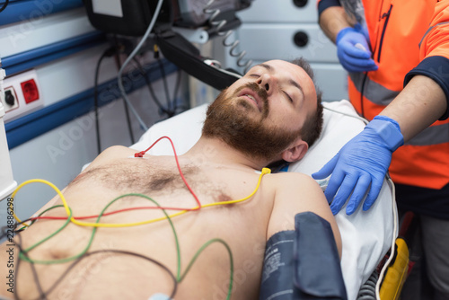 Foto ecg electrodes on patient chest in ambulance