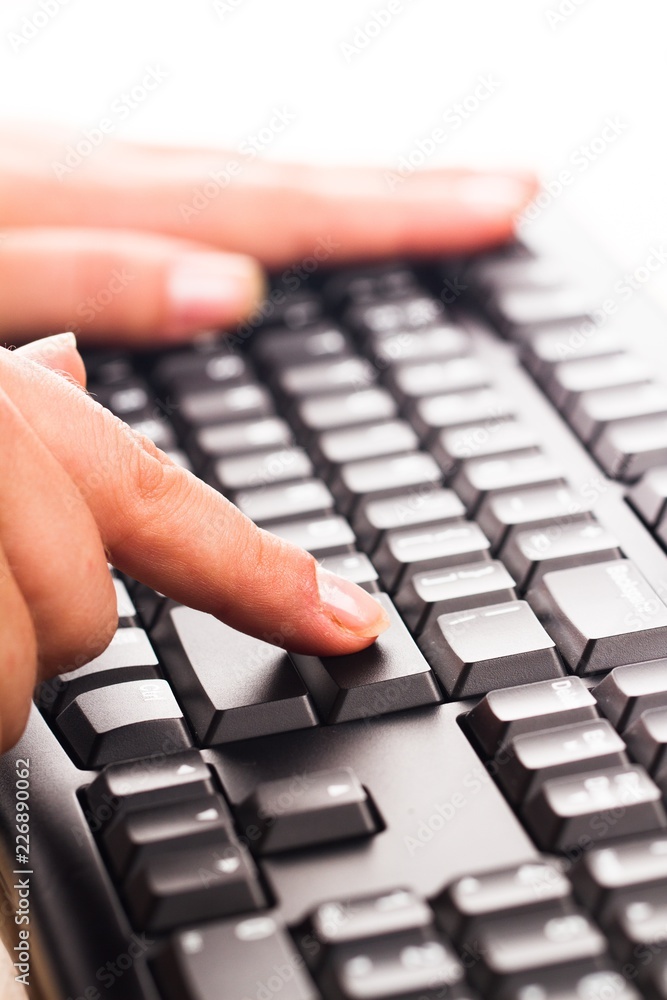 Finger Pressing the Enter Key on a Keyboard Finger Pressing the Enter Key on a Keyboard