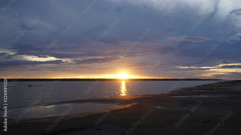 Obraz premium Sunset over the Amazonas River near Mocagua, Colombia