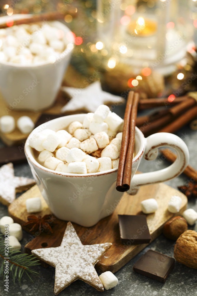 Hot chocolates with marshmallows and Christmas cookies Hot chocolates with marshmallows and Christmas cookies