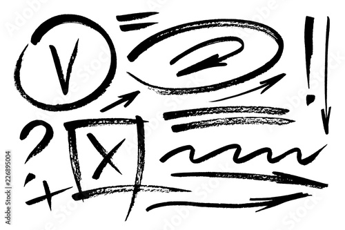 Vector hand drawn design elements. Ink brush drawn notes and marks. Set of artistic elements such as arrows, check box, underlines, question mark and exclamation point. Monochrome collection.