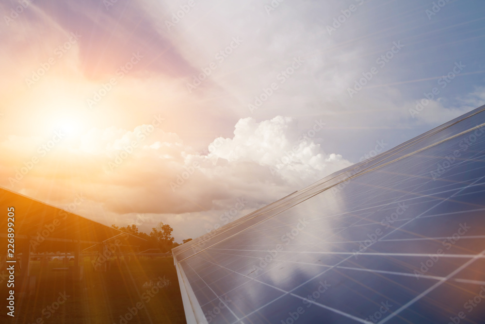 Fototapeta premium Solar energy with blue sky, It's clean and energy for free use. This is a system that adjusts to the sun