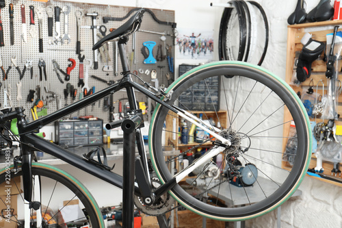 Sport bicycle ready for expertise in repair shop