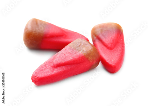Colorful candy corns for Halloween party on white background