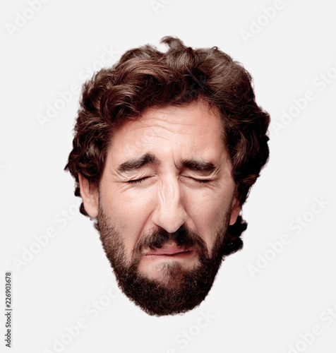 young crazy bearded man cutout head expression isolated.. sad concept photo