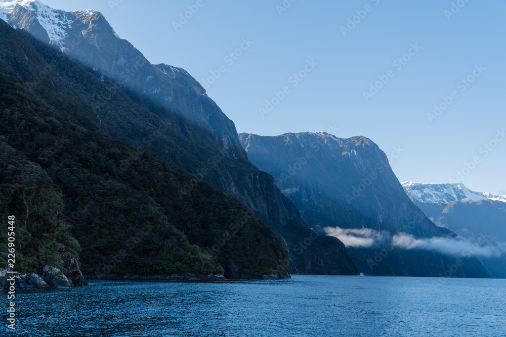 rays of sunlight in Milford Sound, New Zealand