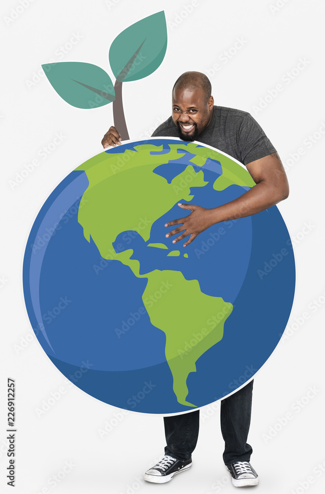Cheerful man with an environmental conservation symbols Cheerful man with an environmental conservation symbols
