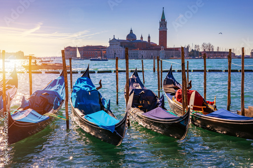 Sunny day in San Marco square, Venice, Italy. Venice Grand Canal. Architecture and landmarks of Venice. Venice postcard with Venice gondolas