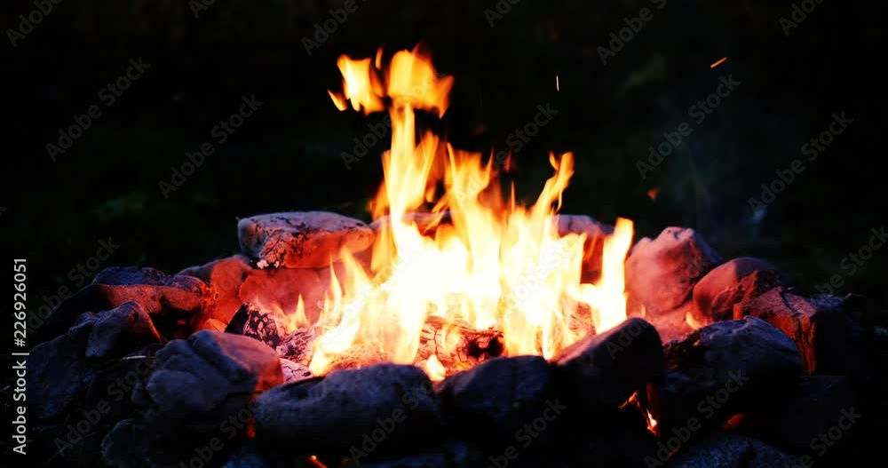 C4K shallow DOF shot of the burning campfire