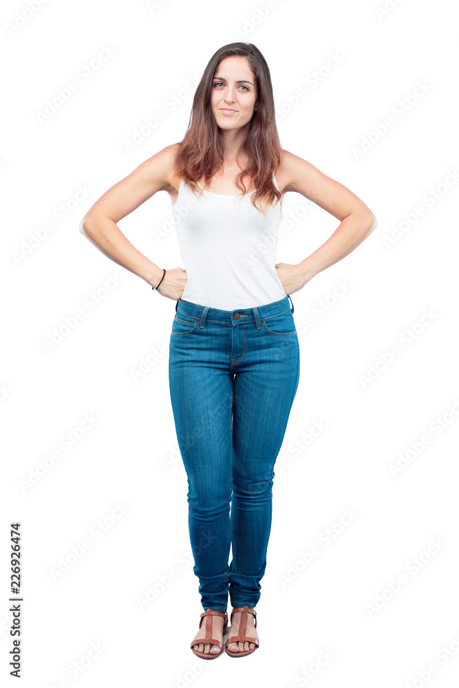 young pretty girl full body with a proud, satisfied and happy look, with  both hands on hips, as if confidently facing a challenge. Akimbo arms pose  with a broad smile. Photos