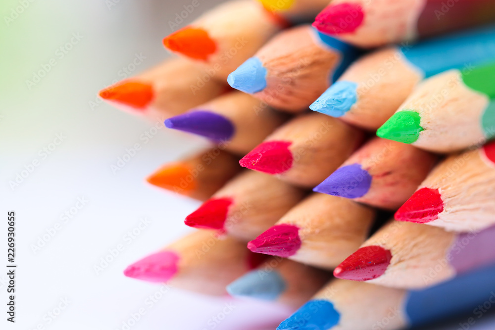 Color pencils on white background.Selective focus. Color pencils on white background.Selective focus.