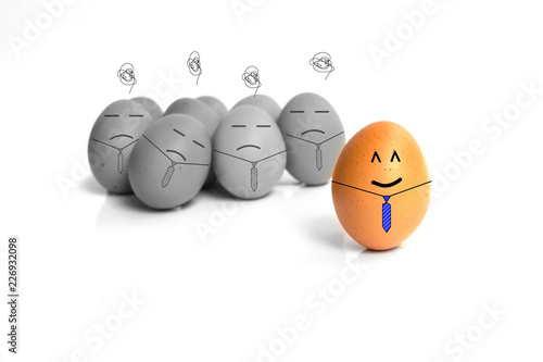 Happy business egg and unhappy eggs