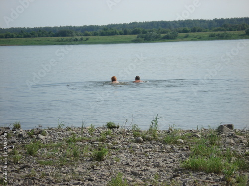 beauty in Nature day environment Growth lake leisure activity men outdoors people Plant relaxation Swimming 