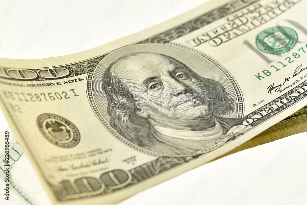 Hundred dollar banknote on white background. Money and banking. Hundred dollar banknote on white background. Money and banking.