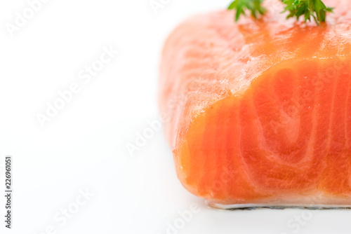 Fresh salmon steak on white background.