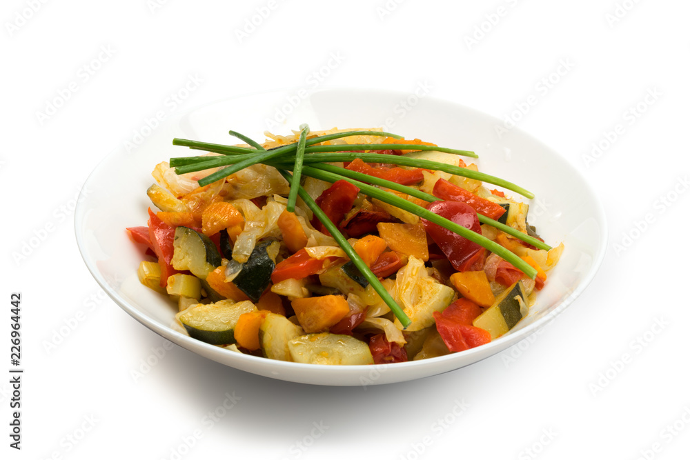 Fried Vegetable Mix with Zucchini, Sweet Pepper, Tomatoes, Onions Close Up Fried Vegetable Mix with Zucchini, Sweet Pepper, Tomatoes, Onions Close Up