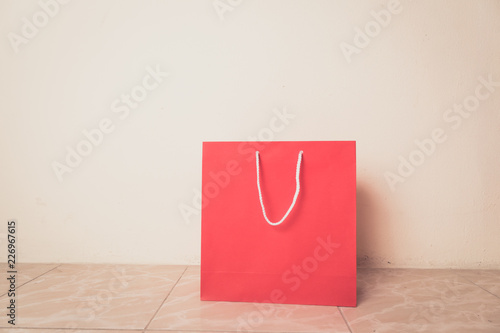 red shopping bag and copy space for plain text or product