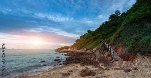 Fototapeta Naklejka Na Ścianę i Meble -  The wooden walkway beside the rock beach at Khao Laem Ya Mu Ko Samet National Park