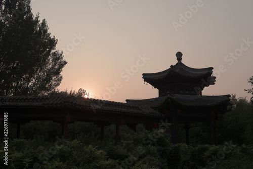 silhouette of temple at sunset