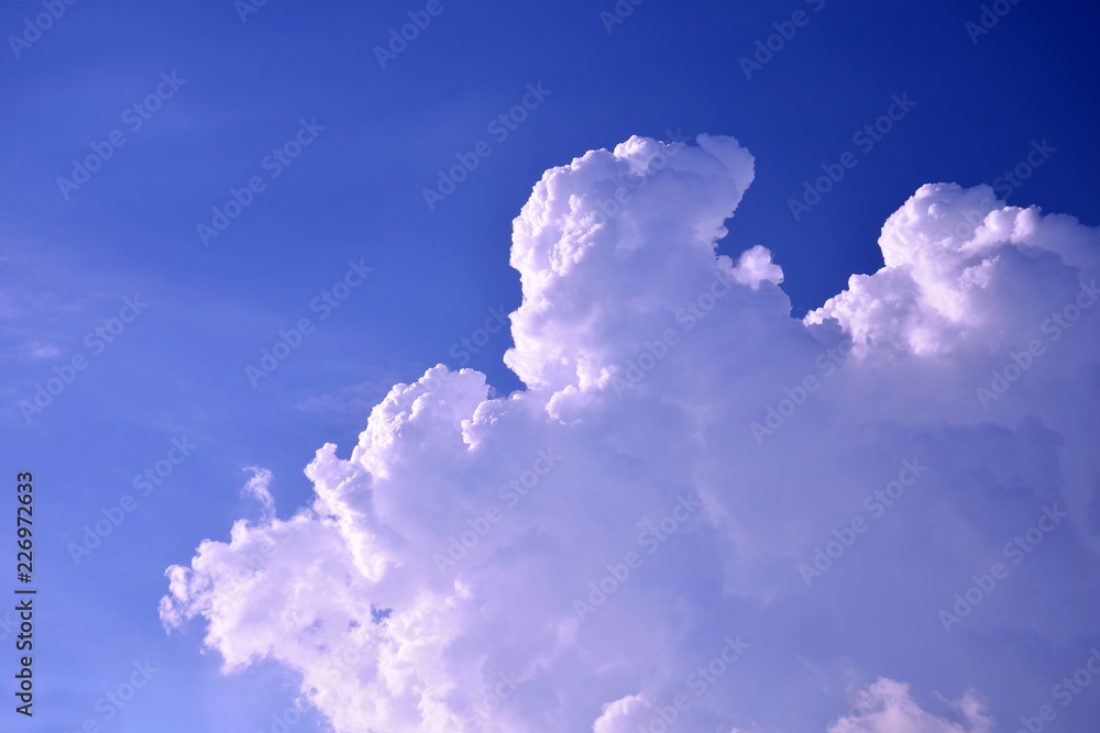 Fotografie White clounds on blue sky background,use for backdrop or web design,soft focus
