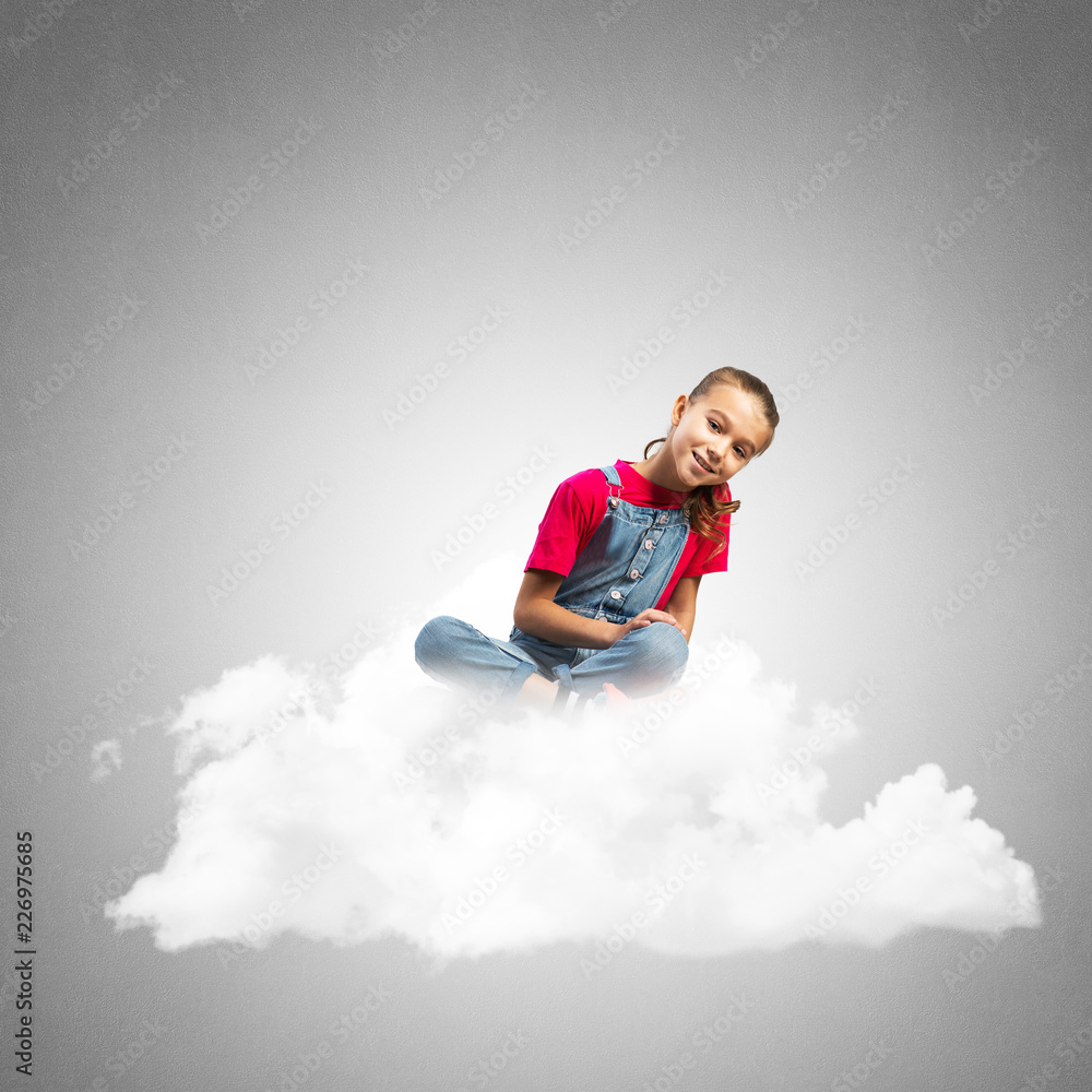 Concept of careless happy childhood with girl dreaming about something Concept of careless happy childhood with girl dreaming about something