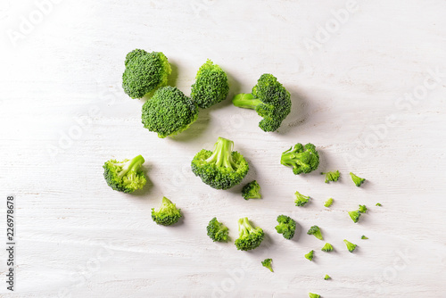 Fresh broccoli on white wooden background