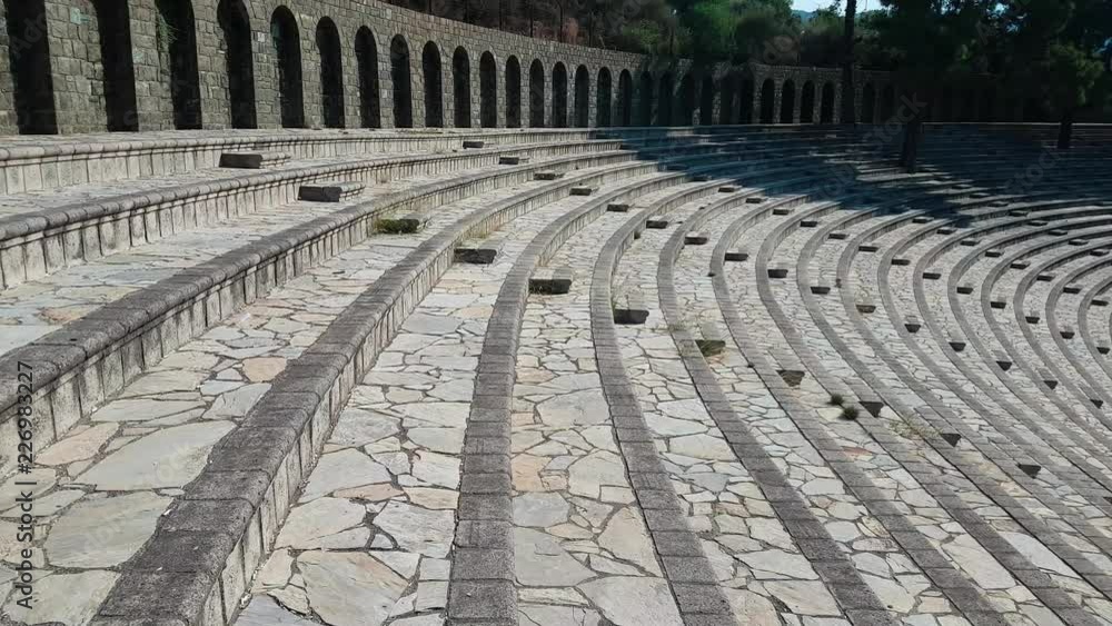 The ruins of old city debris of Turkish amphitheater. Archaeological Attraction. Ancient city Hierapolis near Marmaris in Turkey The ruins of old city debris of Turkish amphitheater. Archaeological Attraction. Ancient city Hierapolis near Marmaris in Turkey