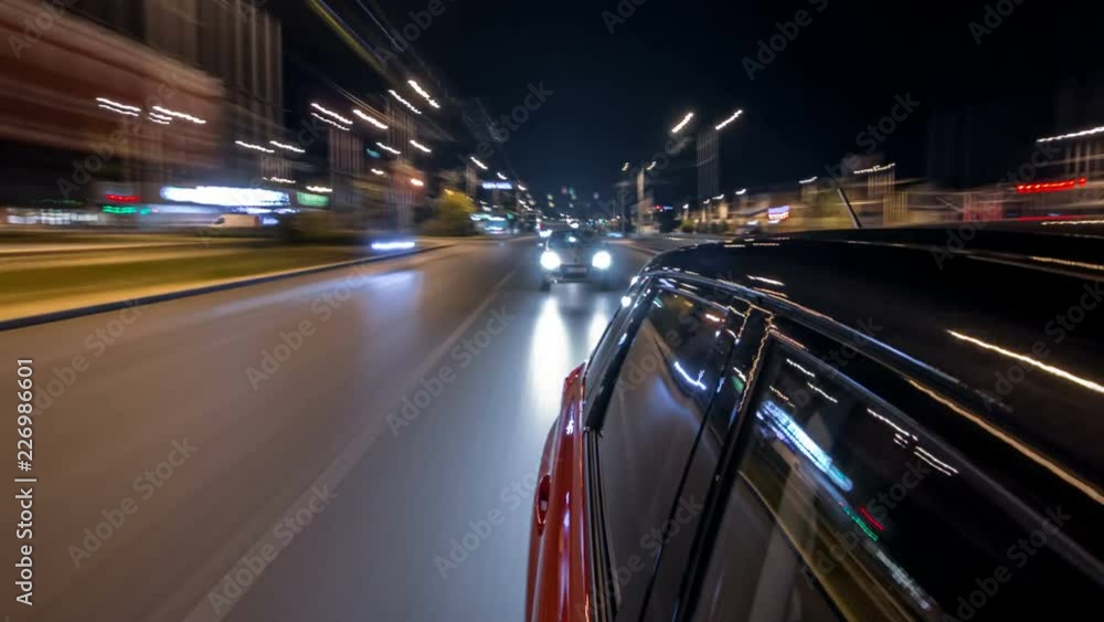Drivelapse from side of car moving on a night avenue in city timelapse hyperlapse Drivelapse from side of car moving on a night avenue in city timelapse hyperlapse