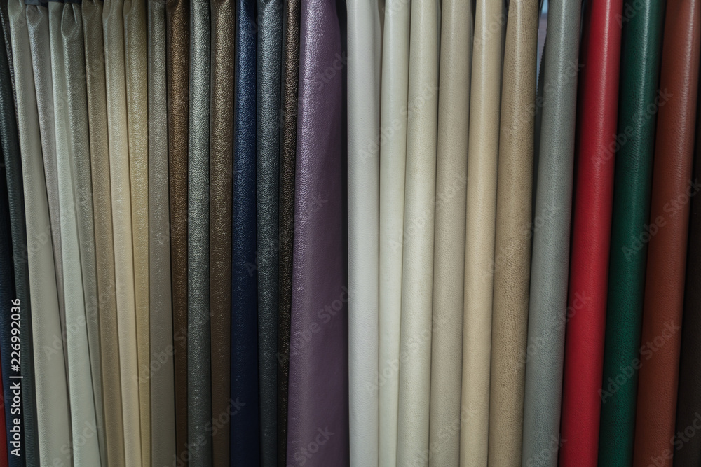 A wide selection of leather fabrics in the store.