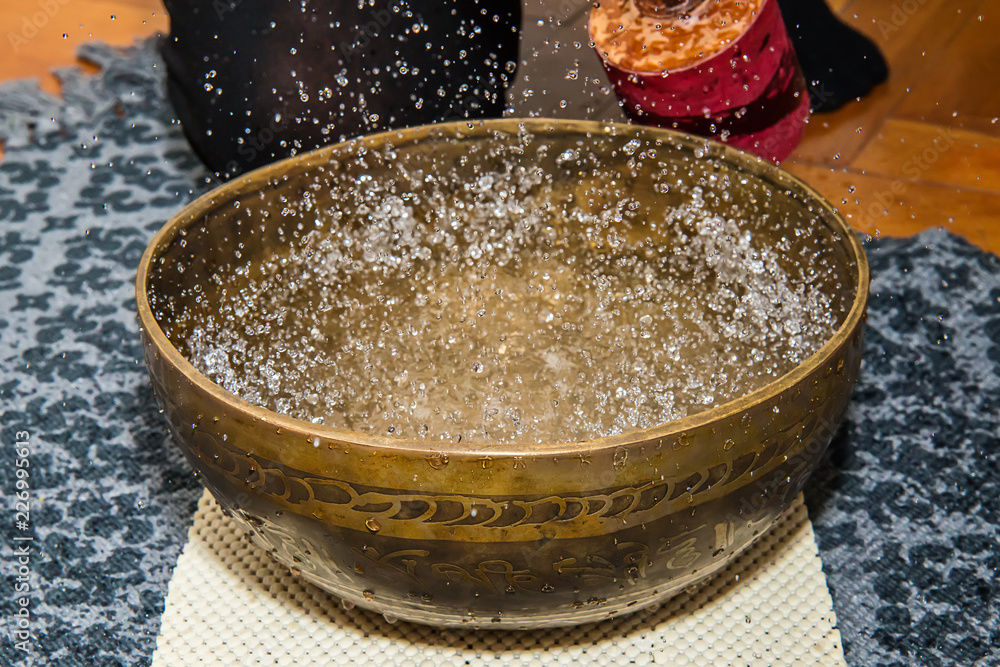 Naklejka premium Tibetan handcrafted singing bowls. Tibetan sound massage.