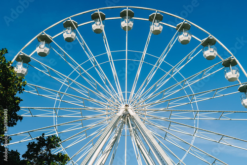White Ferris Wheel In Fun Park