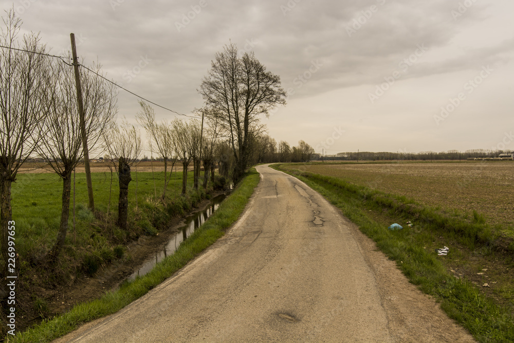 Obraz premium Casarile countryside sunset Italy