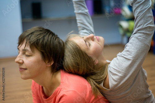Two women dancing dance contact improvisation