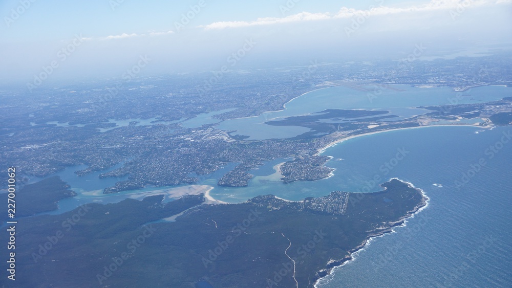 aerial view of island in the sea from airplane aerial view of island in the sea from airplane