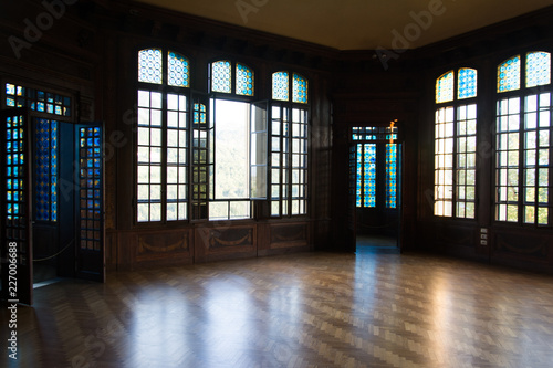 Interior  empty room  wooden floor  windows  sunbeams 