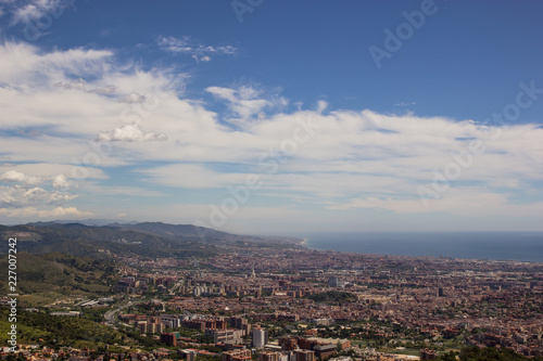 View on Barcelona city and mediterranean sea from Tibidabo hill