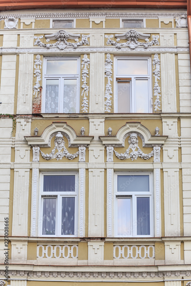 Obraz premium Fragments of facade of an Art Nouveau tenement house located on eastern frontage of Old Market Square in Przemysl, Poland 