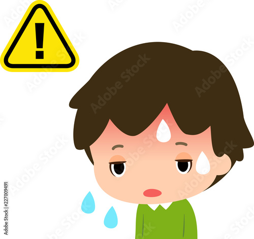 顔が赤く体調が悪そうな男の子