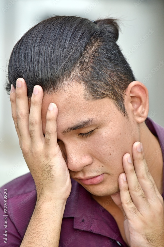 Fototapeta premium Depressed Filipino Person