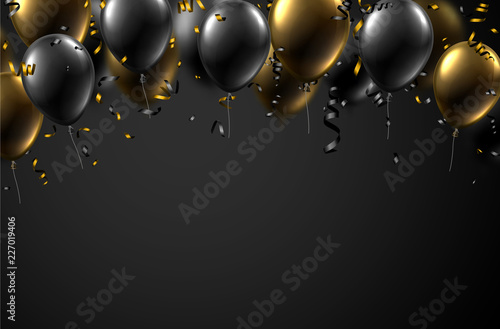 Festive background with black and golden shiny balloons and serpentine.