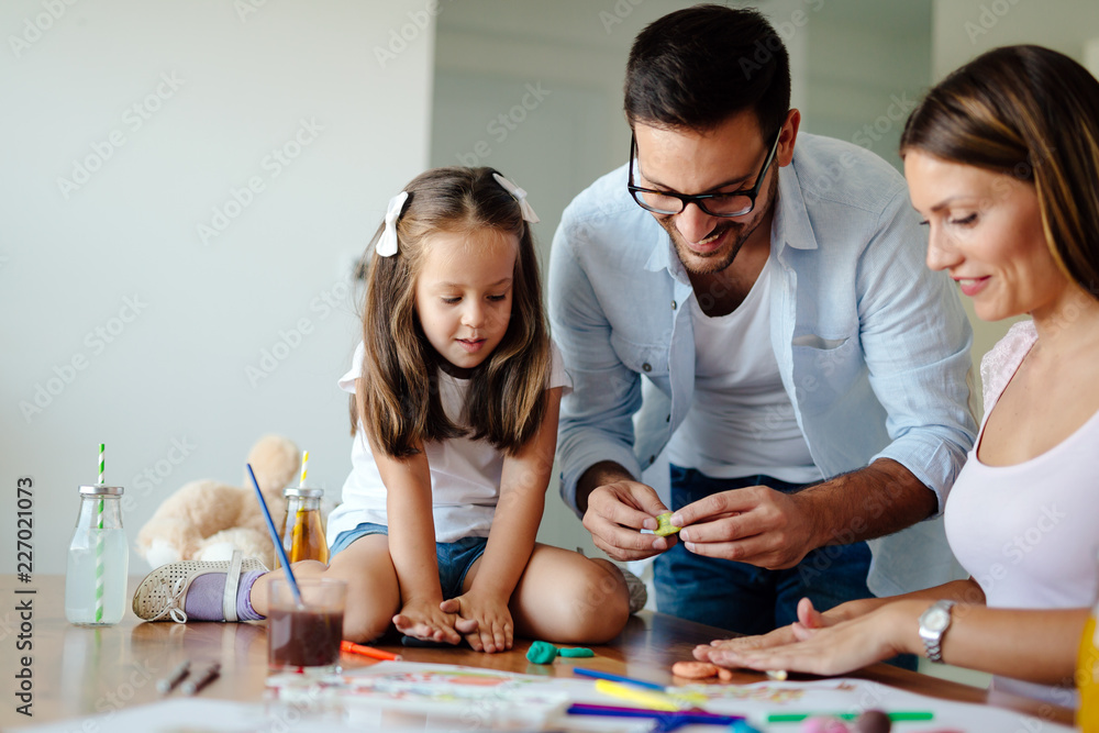 Fototapeta premium Happy familiy spending fun time at home