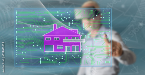 Man touching a digital smart home automation concept